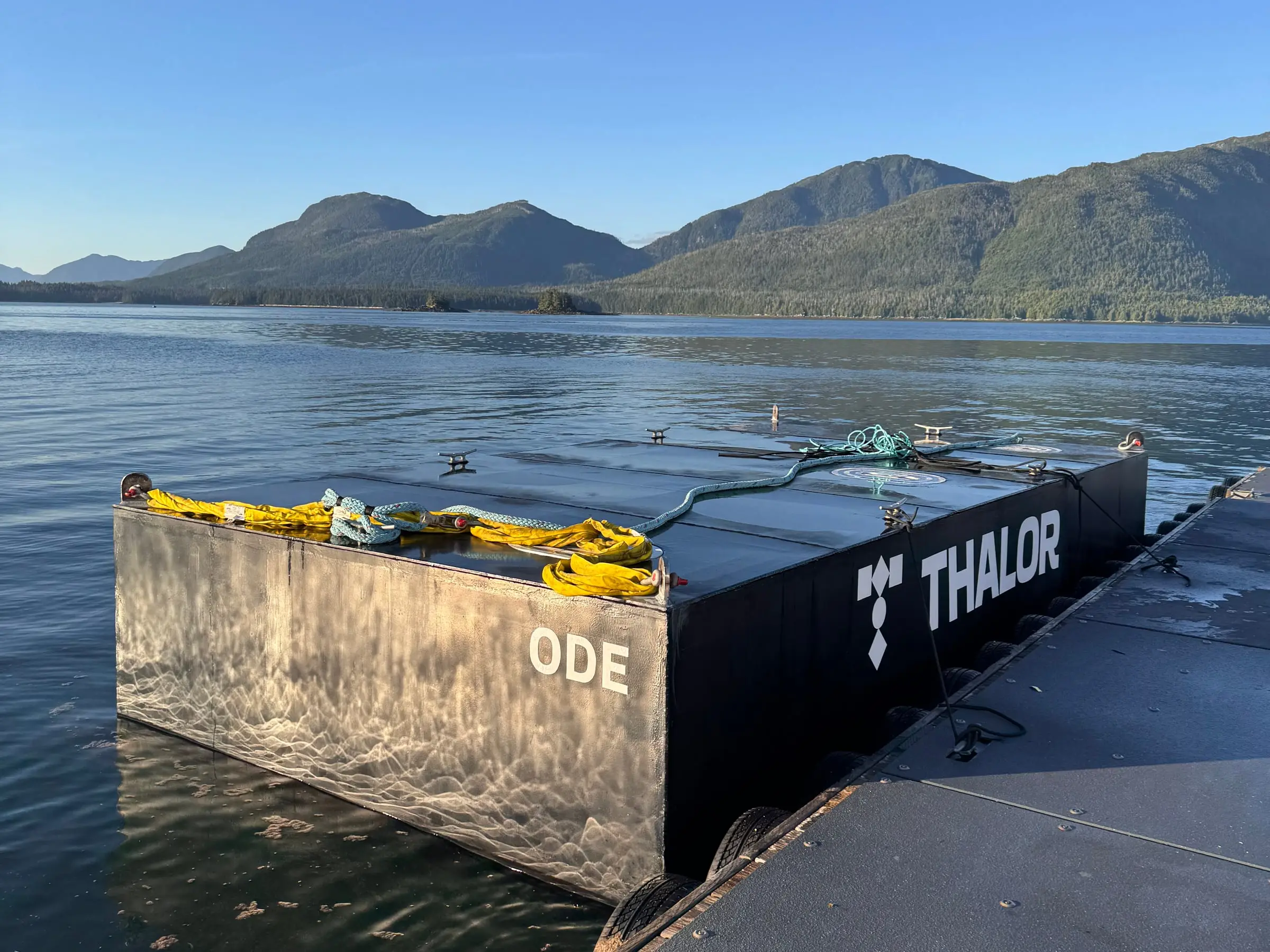 ODE-001 moored at the Metlakatla dock, lifting slings on deck